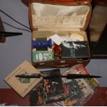 A case of miscellaneous to include carnival glass, tribal spear, Beatle and Elvis ephemera etc.