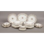 A Royal Grafton bone china nine place dinner service decorated in The Regency design, 32 pieces.