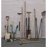 A quantity of gardening / landscaping tools, including loppers, spades etc.