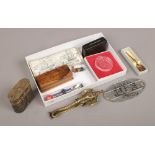 A box of collectables to include reproduction scrimshaw with whaling scene, Chinese tobacco pot,