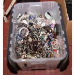 A large quantity of costume jewellery including beads, bangles, necklaces etc.