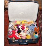 A suitcase of soft toys, mainly McDonalds examples.