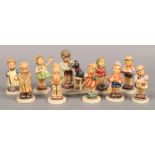 Ten Goebel ceramic figures of children mainly Hummel club examples.