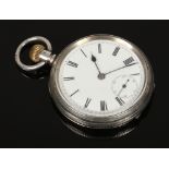 A silver pocket watch with Roman numeral markers and subsidiary dial.