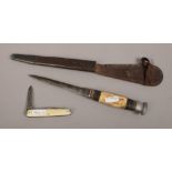 A William Rodgers bone handled throwing knife in leather sheath along with a George Wolstenholme pen