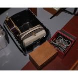 Two cased vintage 8mm film projectors, along with a cased Grundig TK 18 reel to reel player and a