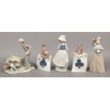 A Lladro figurine of a farmer and dog, along with four Nao figurines to include girl holder toy