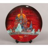 An Anita Harris pottery charger decorated with hand painted St. Basil's Cathedral Moscow, signed