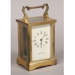 A brass carriage clock by Mappin & Webb Ltd.