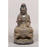 A carved and gilt painted figure of a Buddha, Height 43cm x Width 23cm.Condition report intended