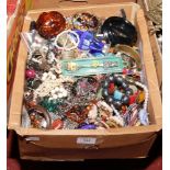 A large quantity of costume jewellery to include beads, bangles, necklaces etc.