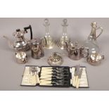 A collection of glass and silver plate to include decanters, Viners tea set, cased cutlery etc.