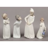 Four Nao ceramic figures of children