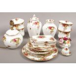A quantity of Royal Albert Old Country Roses mostly decorative wares including vases, wall clock,