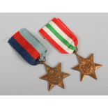 A British 1939-45 star world War II medal along with a World War II Italy star both on ribbons.