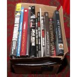 A box of mainly hardback Formula One related books to include biographies, guides etc.