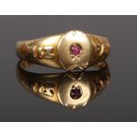An 18ct gold Mizpah ring set with a single ruby in a horse shoe. Assayed Birmingham 1911. Size M.