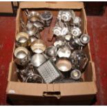 A box of metalwares, mostly silver plate including candelabras, ornaments, tankards, cruets etc.