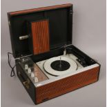 An ALBA portable record player.