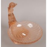 An Art Deco peach satin glass shell formed dish on figural stand.Condition report intended as a