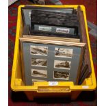 A box of framed cigarette cards to include trains, cars, landscapes etc.