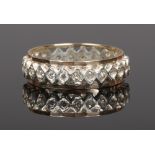 A 9ct gold and silver diamond set eternity ring, size O.