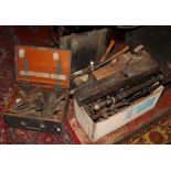 An ammunition crate, wooden crate and box of various metalwares including hand tools, vintage pumps,