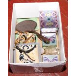 A box of dressing table mirrors and jewellery boxes.