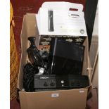 A box of Microsoft gaming consoles including two Xbox 360 (one boxed) an Xbox and various leads