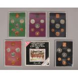 Five Royal Mint proof sets; 1975, 1976, 1978 and 1980, along with The Royal Mint United Kingdom