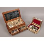 Two jewellery boxes of costume jewellery to include bracelets, pendants, beads, bangles, rings etc.