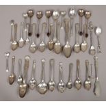 A large quantity of silver and white metal spoons to include coffee spoon with coffee bean terminals