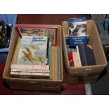 Two boxes of military air craft and aviation books.