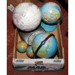 A quantity of world globes including an interactive Oregon scientific example.