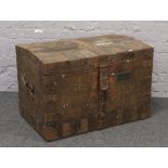 A 19th century bound oak twin handle trunk with bronze name plaque; reads C. B. Balfour.