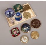A group of collectables to include compacts, glass paperweights etc.