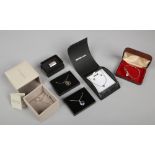 Six items of silver jewellery including a bracelet, earring and necklace suite, a boxed diamonds