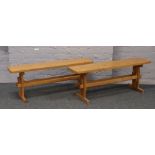 A pair of pine benches of pegged construction Length 123cm x Depth 29cm x Height 46cm.