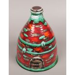 An Anita Harris pottery hand painted ornament decorated as a dome brick building signed by Anita