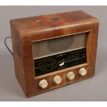 A vintage Bush valve three wave radio in walnut case type VHF.41 Condition report intended as a