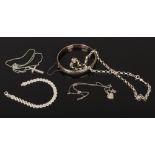 A collection of 925 silver jewellery to include bangles, belcher chain, bracelet and neck chains,