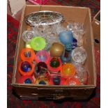 A box of mixed glassware to include crystal paperweights, drinking glasses, liquor set etc.