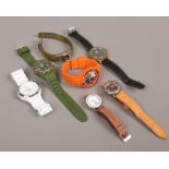 A quantity of ladies and gents wristwatches including DKNY, Limit, Lacoste etc, along with a vintage