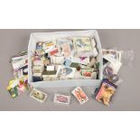 A box of collectors cards including Brooke Bond Tea, Lipton, Merlin etc.