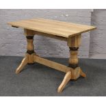 A hardwood refectory table.