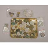 A quantity of mainly British pre-decimal coins to include four generations of The Royal Family