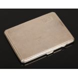 A silver cigarette case, assayed Birmingham 1952 by Joseph Gloster Ltd.