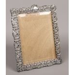 A Victorian silver photograph frame with pierced and scrollwork decoration, assayed Birmingham