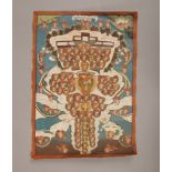 A painted Tibetan Thangka decorated with Buddhas and with inscriptions verso. (50cm x 35cm).