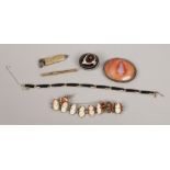 A small quantity of jewellery including cameo bracelet, agate brooch, cigar cutter and propelling